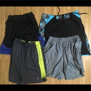 Lot of 4 men’s athletic shorts. Size medium/small